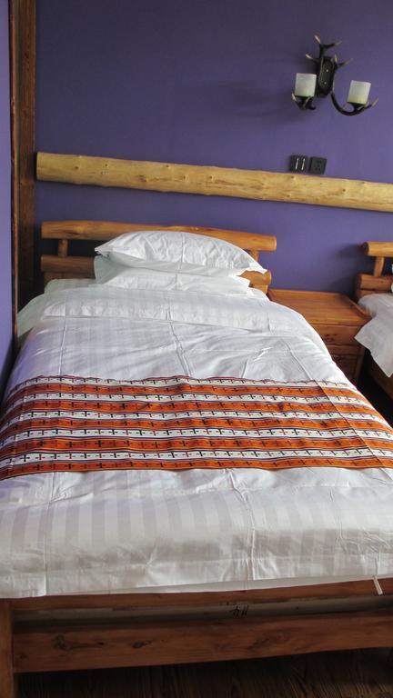 Nirvana Hotel, Restaurant & Bar Xiahe Room photo